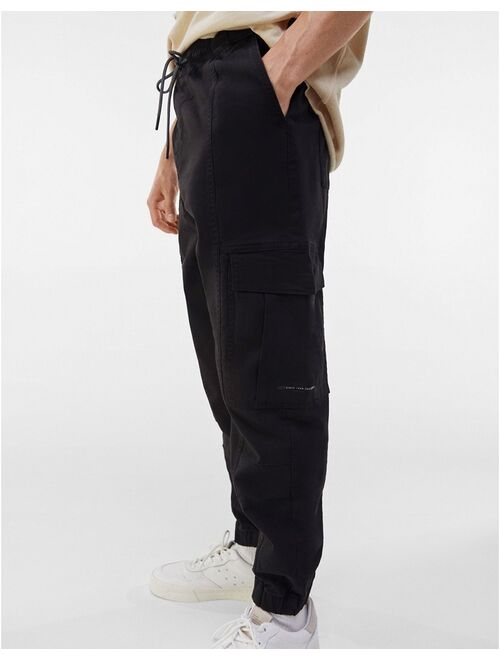 Bershka belted cargo pants in black