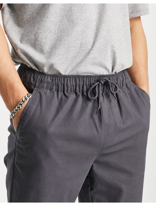 ASOS DESIGN slim chinos with elasticated waist in charcoal