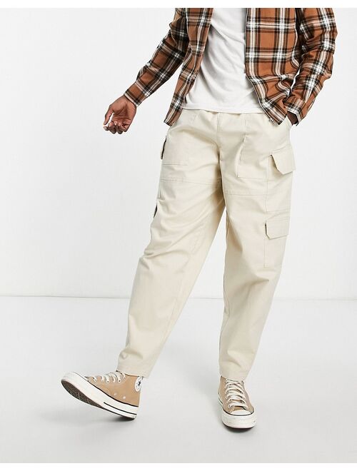 ASOS DESIGN oversized tapered cargo pants in beige