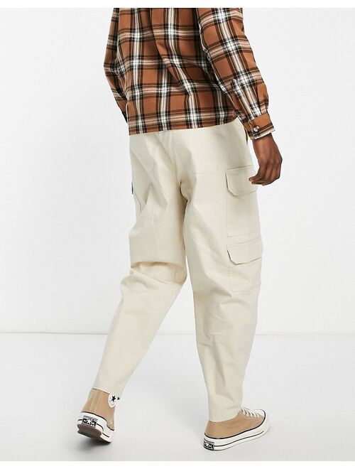 ASOS DESIGN oversized tapered cargo pants in beige