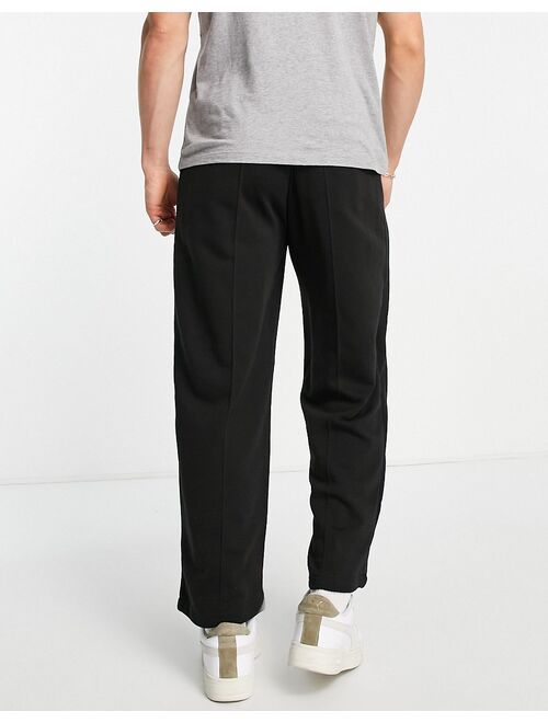 PUMA straight leg pants in black