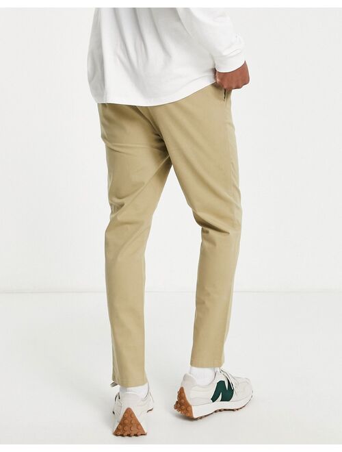 ASOS DESIGN skinny chinos with elastic waist in mid beige