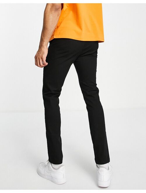 ASOS DESIGN skinny chinos in black