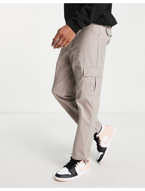 ASOS DESIGN tapered cargo pants in brown