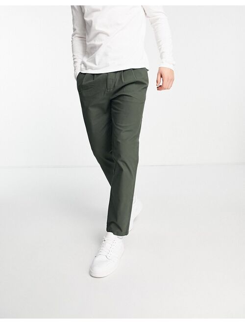 ASOS DESIGN cigarette chinos with pleats in dark green