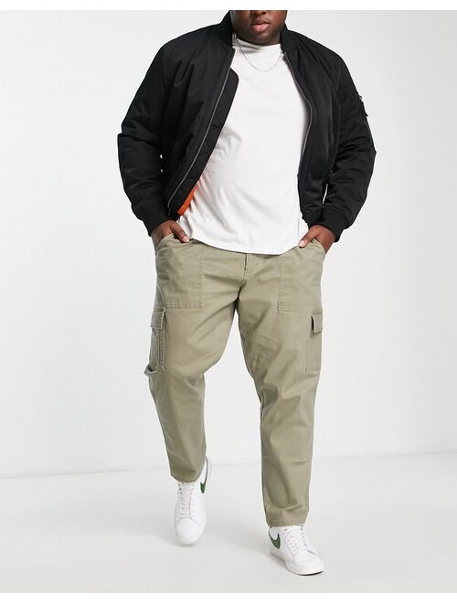 ASOS DESIGN tapered cargo pants in washed khaki