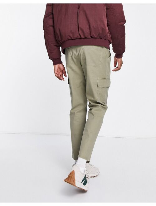 ASOS DESIGN tapered cargo pants in washed khaki