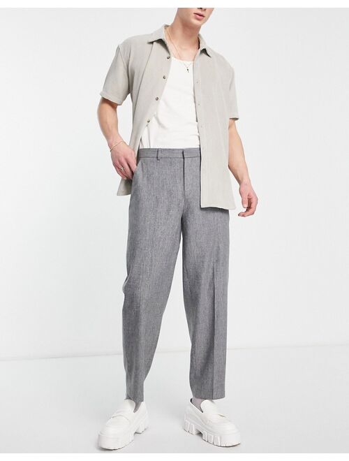 ASOS DESIGN oversized tapered wool mix smart pants in puppytoooth