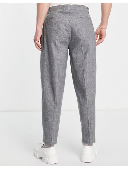 ASOS DESIGN oversized tapered wool mix smart pants in puppytoooth