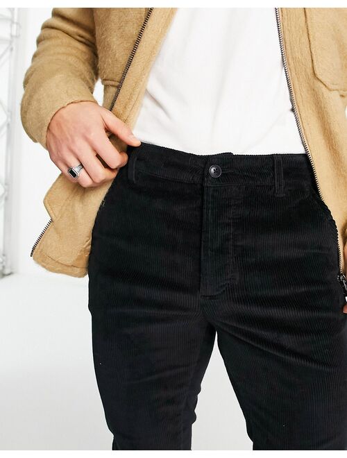 ASOS DESIGN skinny stretch cord pants in black