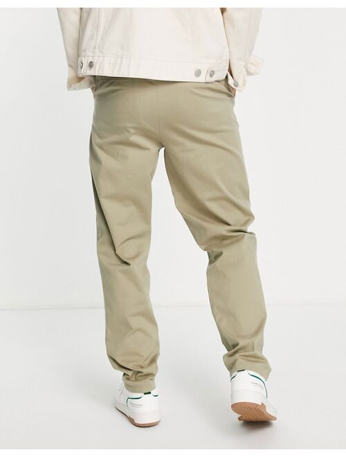 ASOS DESIGN skater fit chinos with relaxed leg in dark beige