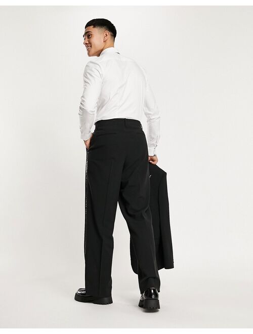 ASOS DESIGN wide leg tuxedo pants in black with side stripe