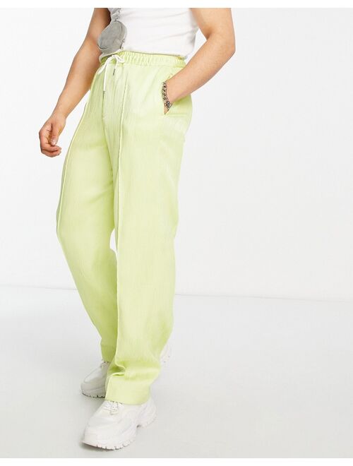 ASOS DESIGN wide leg plisse pants with rubber drawstring in citrus yellow