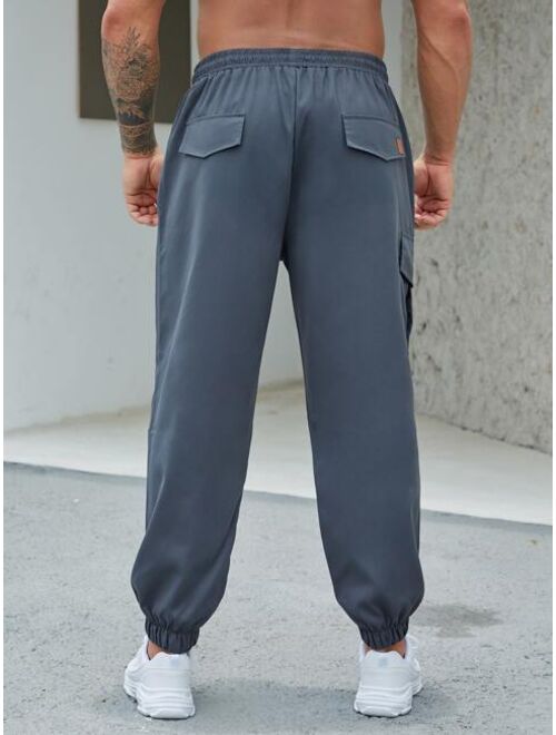 Shein Extended Sizes Men Patched Detail Flap Pocket Drawstring Waist Cargo Pants