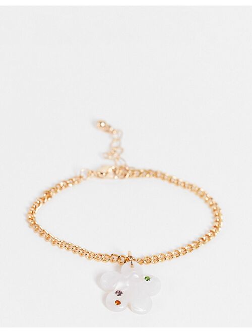 ASOS DESIGN chain bracelet with hot fix crystal flower in gold tone