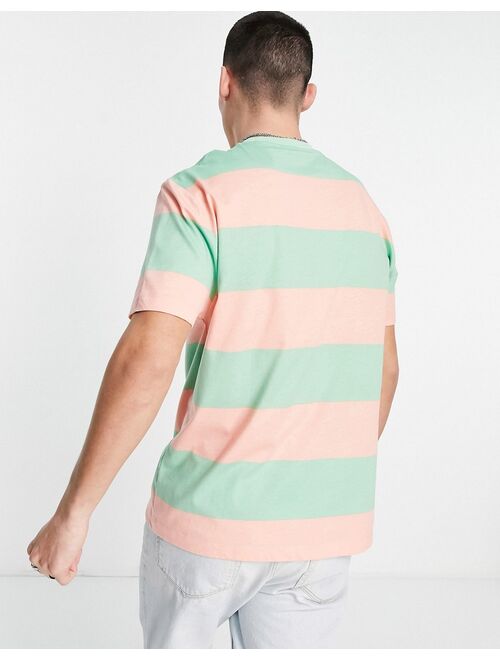 ASOS DESIGN relaxed stripe T-shirt in green & pink color block