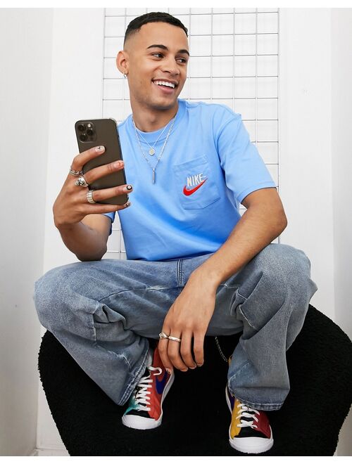 Nike Trend retro logo oversized pocket T-shirt in blue