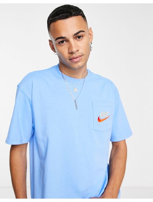 Nike Trend retro logo oversized pocket T-shirt in blue