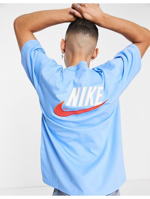 Nike Trend retro logo oversized pocket T-shirt in blue