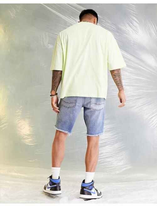 ASOS DESIGN oversized t-shirt in light green with wavey chest print