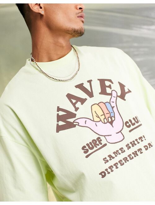 ASOS DESIGN oversized t-shirt in light green with wavey chest print