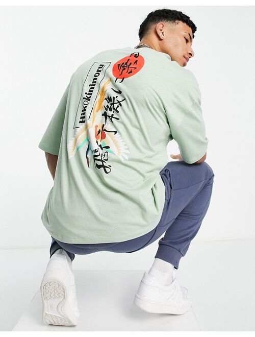 ASOS DESIGN oversized T-shirt in light green with souvenir back print