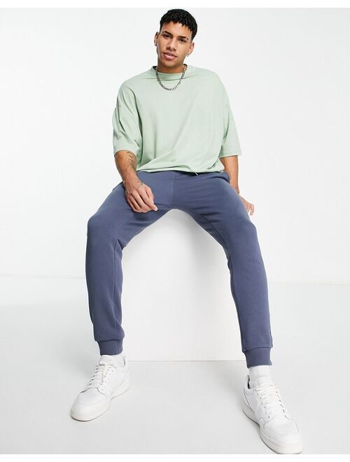 ASOS DESIGN oversized T-shirt in light green with souvenir back print