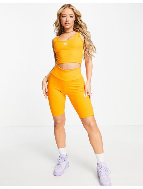 adidas Originals essential legging shorts with logo in orange