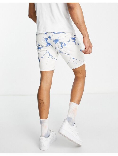 ASOS DESIGN slim denim shorts in printed bleach design