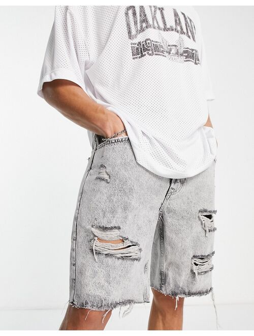 Bershka slim distressed denim shorts in gray