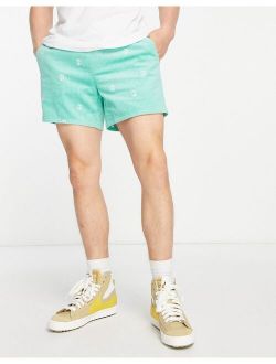 slim shorts with peace embroidery in mint cord