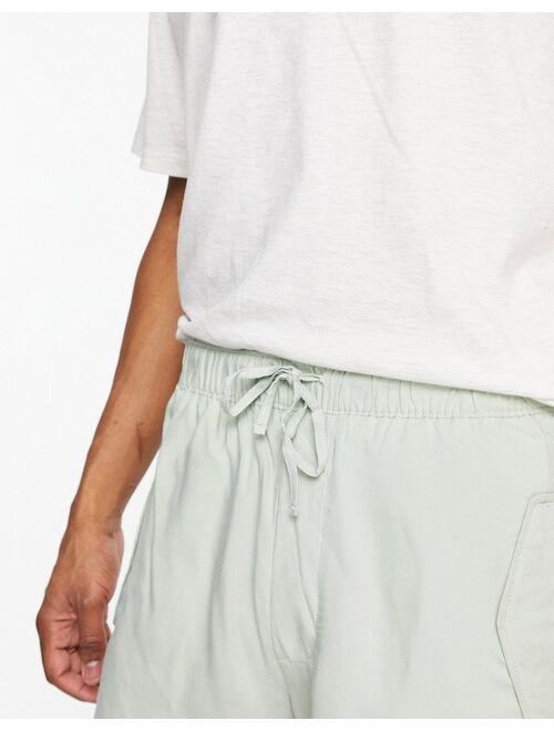 ASOS DESIGN lightweight skater shorts in light green