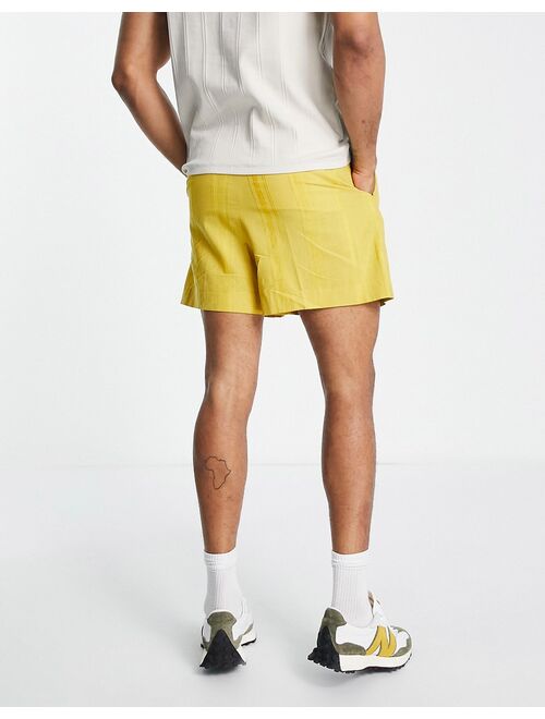 ASOS DESIGN smart bermuda shorts in mustard stripe