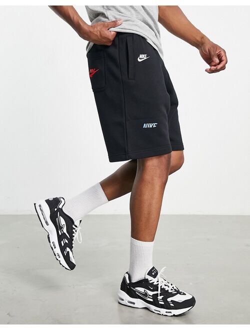 Nike Sport Essentials multi Futura logo fleece shorts in black