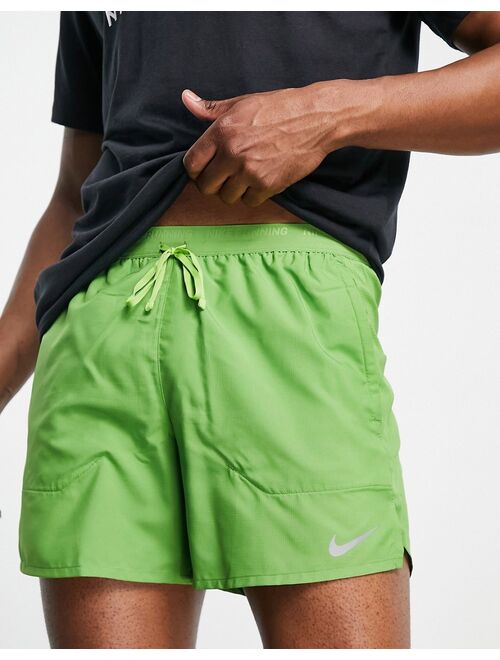 Nike Running Dri-FIT Stride 5-Inch brief-lined shorts in green