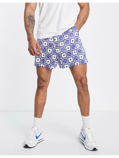 ASOS DESIGN smart cropped bermuda shorts with white and blue tile print