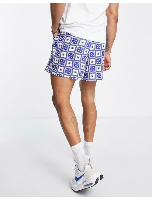 ASOS DESIGN smart cropped bermuda shorts with white and blue tile print