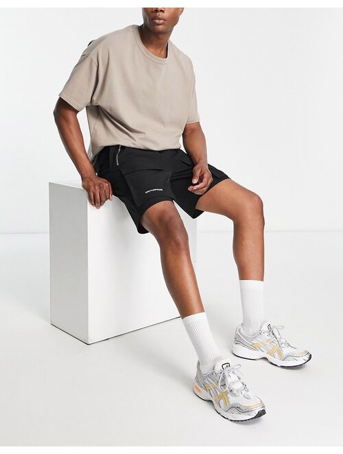 The Couture Club paneled cargo shorts in black