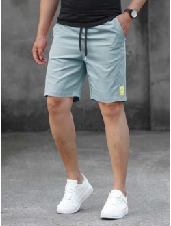 Men Letter Patched Drawstring Waist Shorts