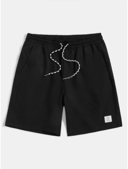 Men Letter Graphic Drawstring Shorts