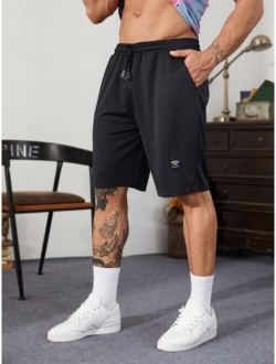 Men Letter Graphic Drawstring Track Shorts