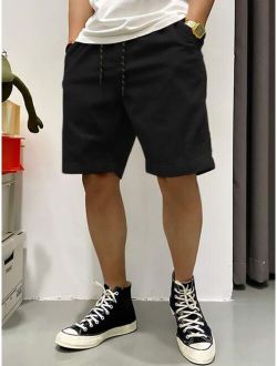 Men Slant Pocket Drawstring Waist Shorts