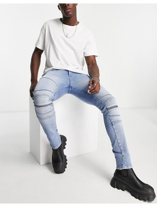 ASOS DESIGN skinny jeans in mid wash with knee zip moto detail