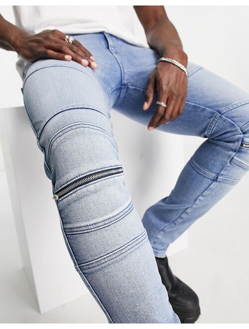 ASOS DESIGN skinny jeans in mid wash with knee zip moto detail