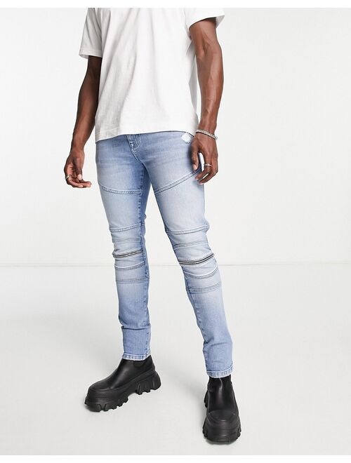 ASOS DESIGN skinny jeans in mid wash with knee zip moto detail