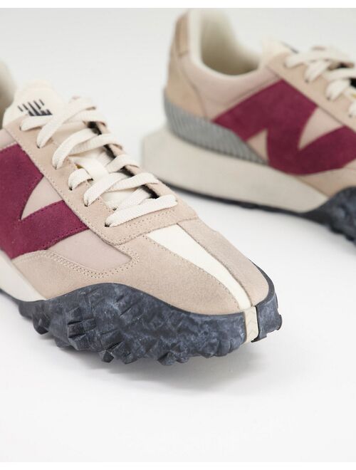 New Balance XC72 sneakers in beige and red