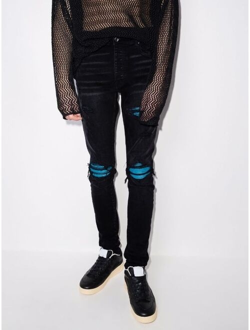 AMIRI MX1 Cracked Paint skinny jeans