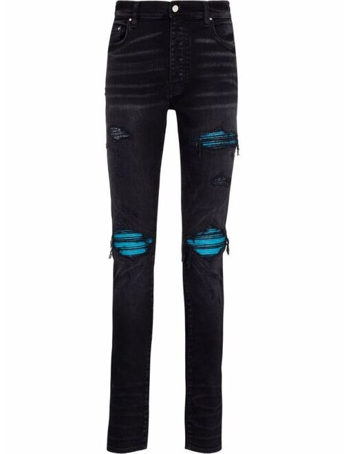 AMIRI MX1 Cracked Paint skinny jeans