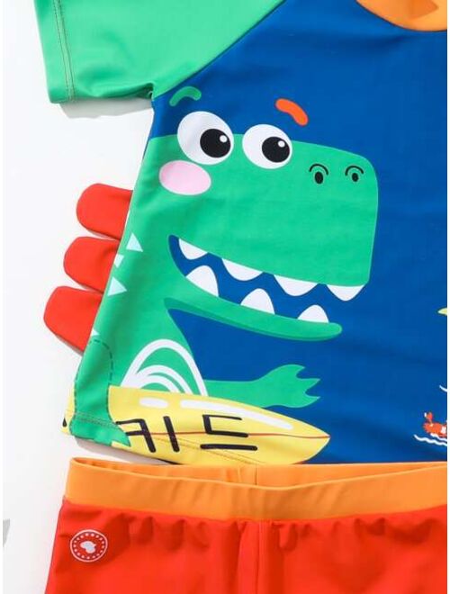 Shein Toddler Boys Cartoon Dinosaur Print Beach Swimsuit