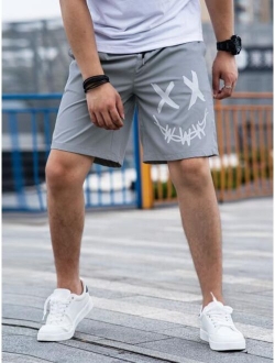 Men Expression Print Drawstring Waist Shorts